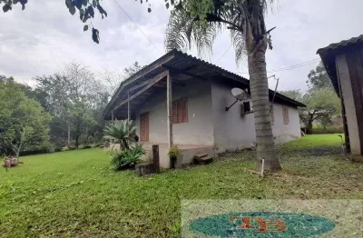 Casa à venda na Estrada Da Cachoeira, 2152, Macaco Branco, Portão