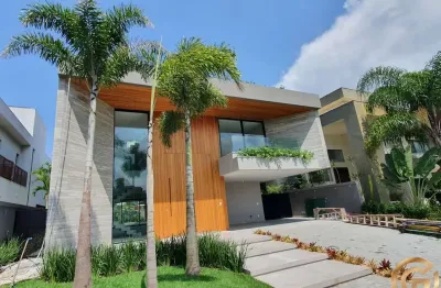 Mansão de 852m², contemporânea, 5 suítes, triplex, piscina e spa, possibilidade mobiliada, na barra da tijuca.