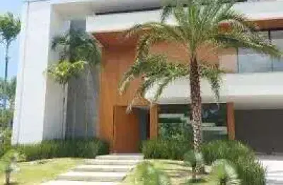 Mansão de alto padrão, em grande lote de 900m², contemporânea, 5 suítes, sótão amplo mais terraço, no riviera da lagoa.