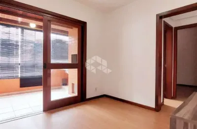 Apartamento de 1 dormitório com sacada, churrasqueira e garagem