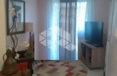 Casa em condomínio fechado com 3 quartos à venda na Avenida Orleaes, 638, Guarujá, Porto Alegre