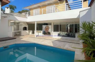 Vende-se casa no cond. carmel - 4 dorm/2sts, repleta de armários, piscina,
