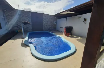 Casa à venda na martim de sá com piscina, área gourmet e ótima localização.