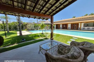 Deliciosa casa jardim acapulco térrea e com ampla área de convivência guarujá sp codigo: 112054