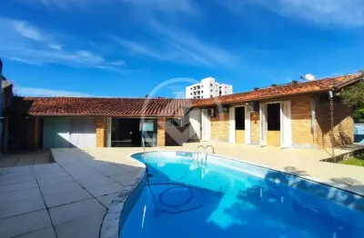 Casa com 4 quartos à venda na Rua Bartolomeu Bueno da Silva, 550, Martim de Sá, Caraguatatuba