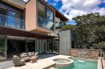 Casa no condomínio horizontal praia brava com 05 suítes, excelente localização n
