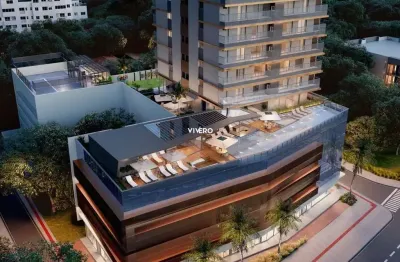 Apartamento com 3 suítes andar alto de frente na praia brava de itajaí