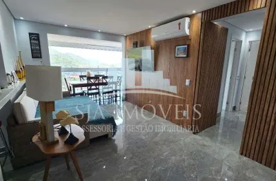 Cobertura duplex pe na areia a venda no centro de bertioga,  136m2 ,  2 dormitorios sendo 1 suite e 2 vagas cobertas + deposito.