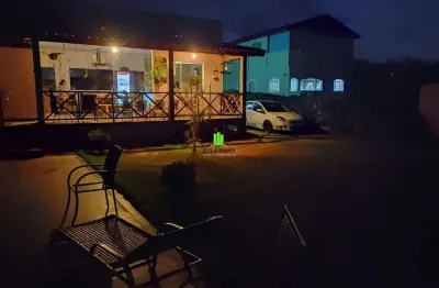 Casa em condomínio fechado com 4 quartos à venda na alameda sapucaias, 135, condomínio estância da mata, jaboticatubas por r$ 1.150.000