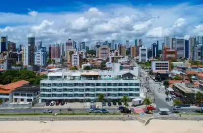 Flat a beira mar  completamente mobiliado para morar ou investir