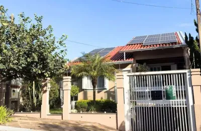 Casa à venda em gravataí, loteamento jardim timbaúva, com 3 quartos, com 145 m²