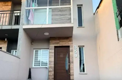 Sobrado à venda em gravataí, morada do vale ii, com 2 quartos, com 67 m²