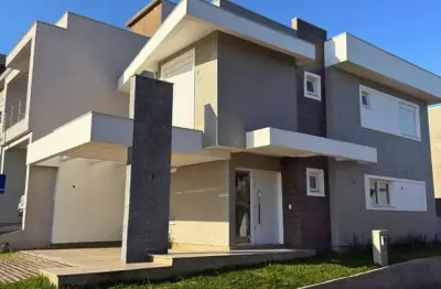 Sobrado à venda em gravataí, cohab c, com 3 quartos, com 140 m², primavera condomínio residencial