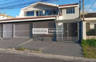 Casa com 7 Dormitórios, 2 Suítes, 380 m², à venda por R$ 1.490.000 - Xaxim, Curitiba (PR)