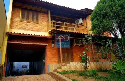 Casa com 5 quartos à venda na Rua Araranguá, 382, COHAB A, Gravataí