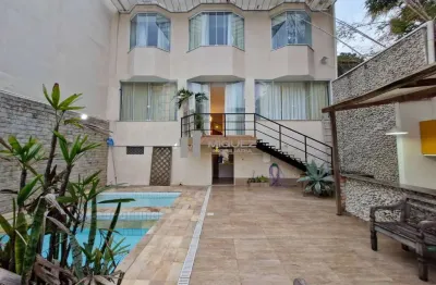 Casa à venda, rua maria amália, tijuca. 5 quartos sendo 4 suítes, área externa piscinas e churrasqueira. 2 vagas. código 22833