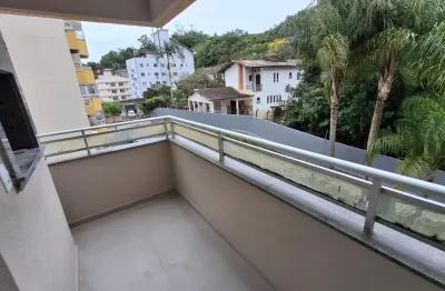 Apartamento 2 dormitórios com suíte e sacada com churrasqueira