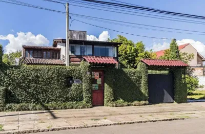 Casa à venda em porto alegre, guarujá, com 3 quartos, 235m²