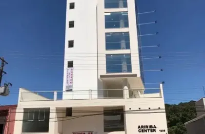 Sala terrea com 1 vaga de garagem em local com excelente visibilidade em balneário