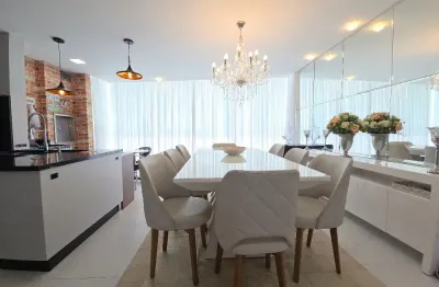 Apto mobiliado com 4 suites, 3 vagas, andar alto no pioneiros em balneário