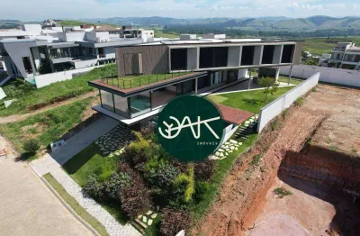 Casa com 5 dormitórios à venda, 835 m² por r$ 7.900.000,00 - condomínio reserva do paratehy - são josé dos campos/sp
