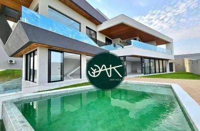 Casa com 5 dormitórios à venda, 600 m² por r$ 7.000.000,00 - condomínio reserva do paratehy - são josé dos campos/sp