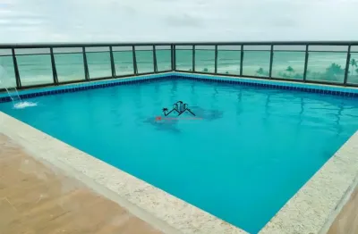 Apartamento 2 dormiórios, suite, churrasqueira, piscina á 100mts da praia - r$ 320 mil