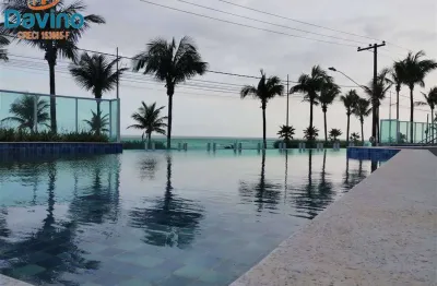 Apartamento pé na areia com vista mar, 2 dormitórios, lazer completo na praia do caiçara por apenas r$544.000,00 à vista