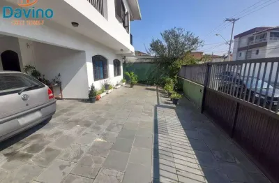 1960milhão - sobrado no boqueirao de praia grande com 4 dormitórios 6 vagas de garagem. Excelente localização.