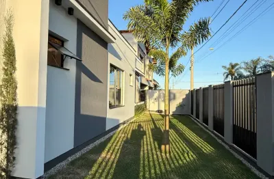 Casa alto padrão três dormitórios sendo uma suíte em tijucas santa catarina