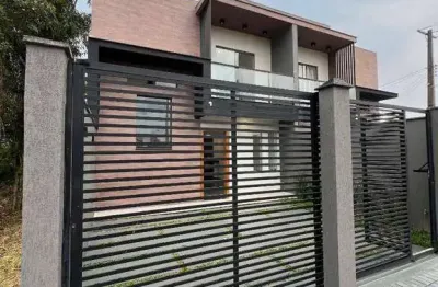 Sobrado novo com piscina e área gourmet – perto da praia!