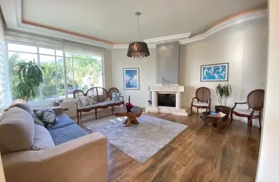 Casa em condomínio fechado com 4 quartos à venda na Estrada Haroldo Soares Glavan, 450, Cacupé, Florianópolis, 390 m2 por R$ 3.300.000