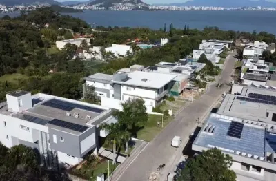 Terreno em condomínio fechado à venda na estrada haroldo soares glavan, 1759, cacupé, florianópolis por r$ 3.700.000