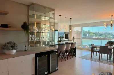 Apartamento à venda em itapema/sc, 3 quartos e 2 vagas de garagem