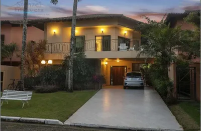 Casa frente ao mar com 4 suítes, 594m² por r$ 3.000.000 - bougainville - bertioga/sp