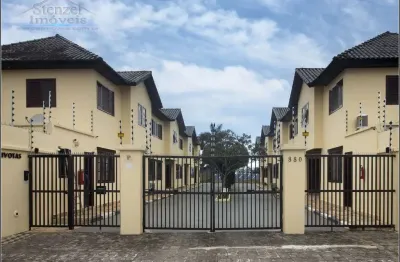 Casa em village com 2 suítes, 82m² por r$ 555.000 - centro - bertioga/sp