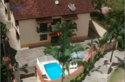 Casa Térrea em Village com 2 Quartos, 64m² por R$ 450.000 - Maitinga, Bertioga/SP - Stenzel Imóveis