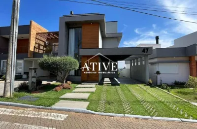 Casa em condomínio fechado com 3 quartos para alugar na rua antônio baggio, 40, loteamento jardim timbaúva, gravataí por r$ 6.600