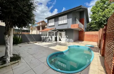 Casa em condomínio fechado com 3 quartos para alugar na Rua David Canabarro, 160, Dom Feliciano, Gravataí por R$ 6.670