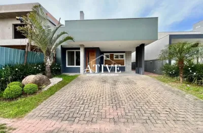 Casa em condomínio fechado com 3 quartos à venda na rua tulipa, 44, são vicente, gravataí por r$ 1.272.000