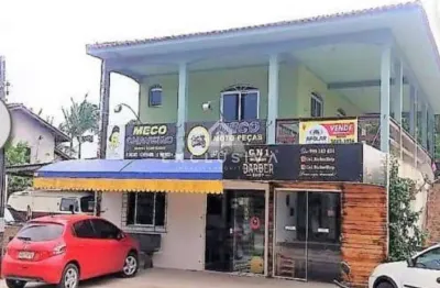 Duas salas comercias + uma kitnet + um apartamento no andar de cima.