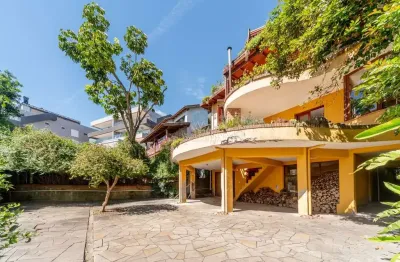 Casa com 4 quartos à venda na rua pão de açúcar, --, vila conceição, porto alegre por r$ 1.850.000