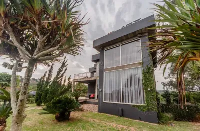 Casa em condomínio fechado com 4 quartos à venda na rua bertha loforte gonçalves, --, vila nova, porto alegre por r$ 3.500.000