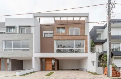 Casa em condomínio fechado com 3 quartos à venda na rua ivo walter kern, --, hípica, porto alegre por r$ 1.670.000