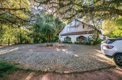Casa com 4 quartos à venda na avenida coronel marcos, --, pedra redonda, porto alegre por r$ 2.400.000