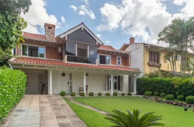 Casa em condomínio fechado com 4 quartos à venda na avenida juca batista, --, cavalhada, porto alegre por r$ 1.180.000
