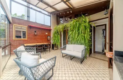 Casa em condomínio fechado com 3 quartos à venda na rua doutor possidônio cunha, --, vila assunção, porto alegre por r$ 1.200.000