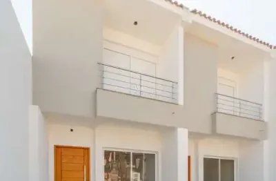 Casa com 2 quartos à venda na rua itacyr rossi, --, guarujá, porto alegre por r$ 500.000