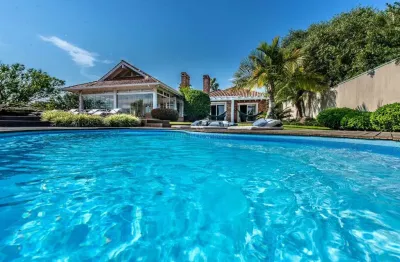 Casa em condomínio fechado com 3 quartos à venda na avenida juca batista, --, belém novo, porto alegre por r$ 3.490.000