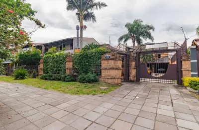 Casa com 3 quartos à venda na avenida orleaes, --, guarujá, porto alegre por r$ 2.000.000